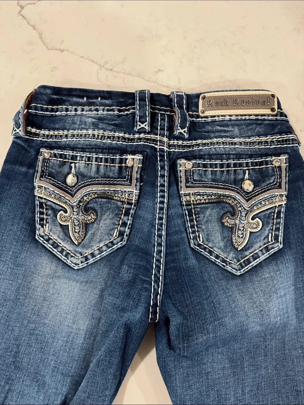 Rock Revival Women's Blue Bootcut Jeans with Embellished Back Pocket